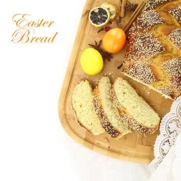 Easter sweet bread with multicolored eggs and shortbread cookies Stock Photos