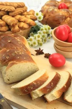 Easter sweet bread with red eggs and shortbread cookies Stock Photos
