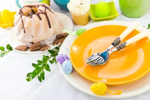 Easter table arrangement eggs sweets Stock Photos