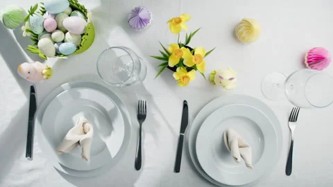 Easter table with colored eggs and flowers Stock Footage 236130729