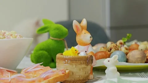 Easter Table Decorations Shift Focus to Family Cat Joining Holiday Celebration Stock Footage 344007578