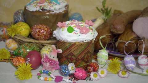 Easter table with Easter cake and sausage Stock Footage 233984144