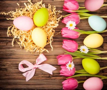 Easter table with flowers and eggs Stock Photos