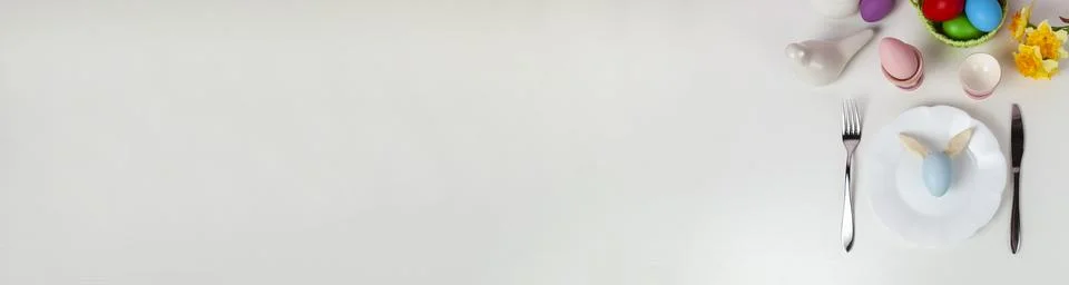 Easter table setting and dinner  festive decorations. Banner. Foto stock