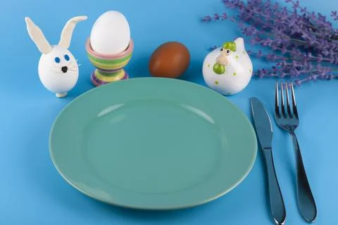 Easter table setting and dinner with  festive decorations Stock Photos