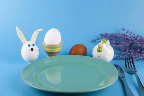 Easter table setting and dinner with  festive decorations Stock Photos
