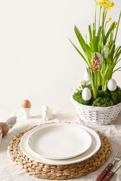 Easter table setting with blue coloful eggs, festive decorations, fresh flo.. Stock Photos