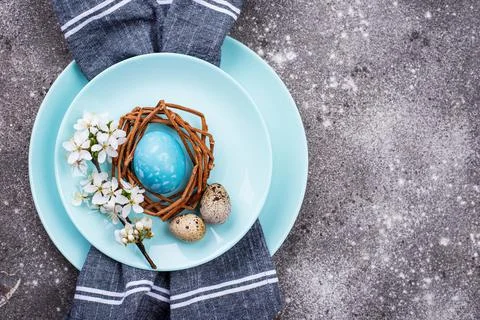 Easter table setting with blue egg Stock Photos