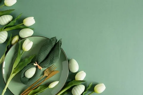 Easter Table Setting with Bunny Napkins and Tulips. Spring Holiday Arrangemen Stock Photos