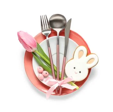 Easter table setting with cookie in shape of bunny, eggs and tulip flower on  Stock Photos
