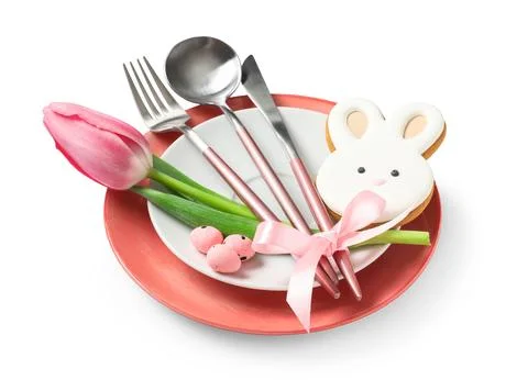 Easter table setting with cookie in shape of bunny, eggs and tulip flower on  Stock Photos