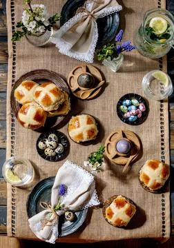 Easter table setting with cross buns Stock Photos