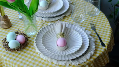 Easter table setting with decorated Easter egg Stock Footage 332701331