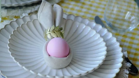 Easter table setting with decorated Easter egg Stock Footage 332701332