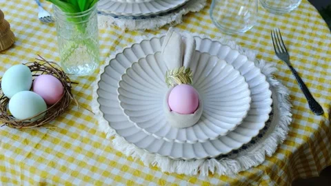 Easter table setting with fresh tulips and Easter eggs Stock Footage 332702016