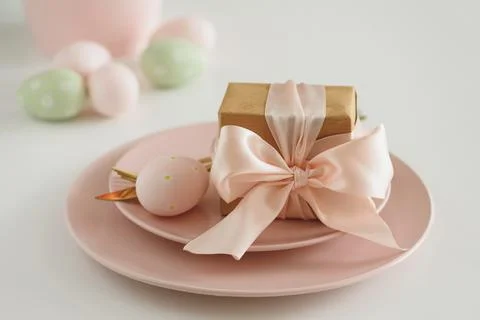 Easter Table Setting with Gift Box, Decorated Eggs and Tulips. Festive Spri.. Stock Photos