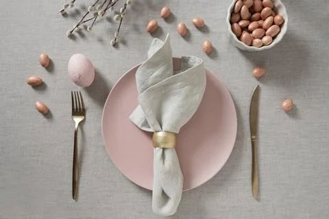 Easter table setting with pink egg and willow branches Stock Photos