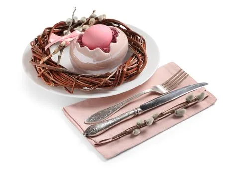 Easter table setting with pussy willow branches, wreath and painted egg on wh Stock Photos