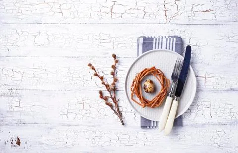 Easter table setting with quail eggs Stock Photos