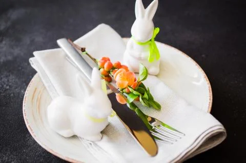 Easter table setting with spring flowering branches. Spring background for me Stock Photos