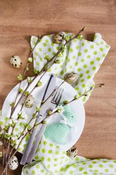 Easter table setting with spring flowers. Stock Photos