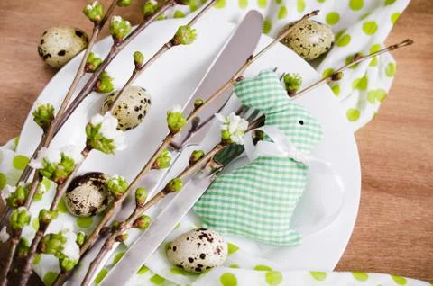 Easter table setting with spring flowers. Stock Photos