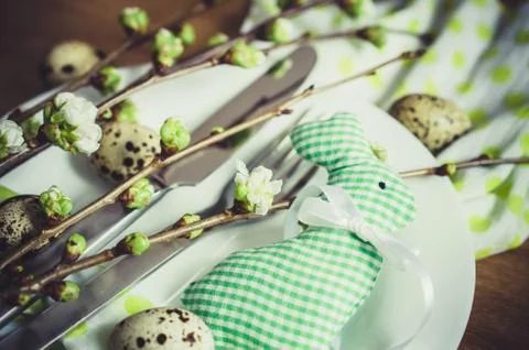 Easter table setting with spring flowers. Stock Photos