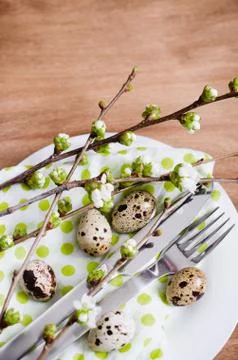 Easter table setting with spring flowers. Stock Photos