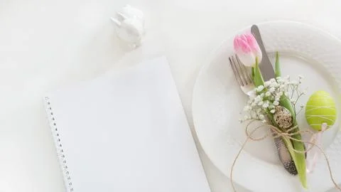 Easter table setting with tulip. Spring dinner. Stock Photos