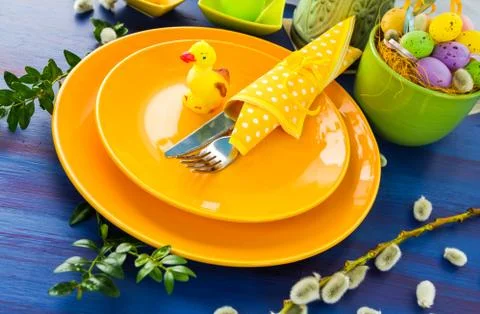 Easter table setting yellow duck Stock Photos