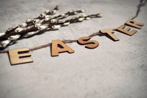 The easter text title with thread and twigs or pussy branches willow flat l.. Stock Photos