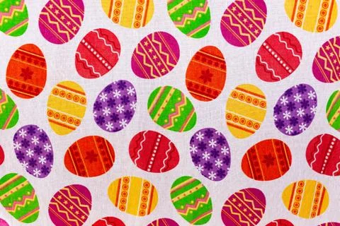 Easter themed tablecloth with colored eggs pattern. Background, texture Stock Photos
