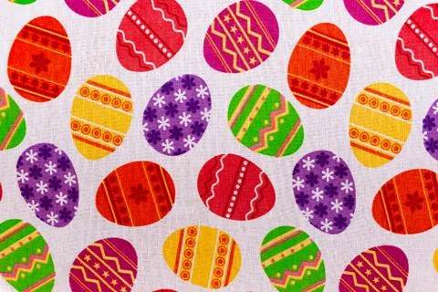Easter themed tablecloth with colored eggs pattern. Background, texture Stock Photos