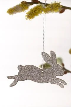 Easter time. Easter rabbit  on willow twigs Stock Photos