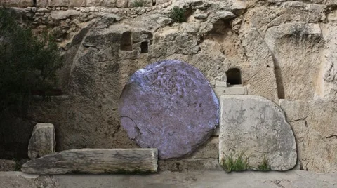 Easter Tomb of Jesus Opening Revealing Internal Light. Large Rolling Stone