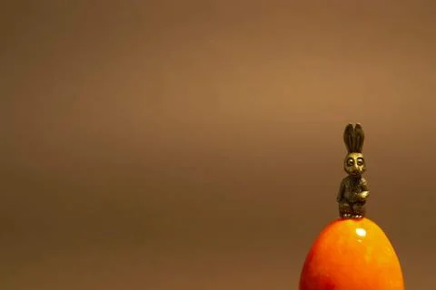 Easter toy rabbit with easter orange egg Stock-Fotos