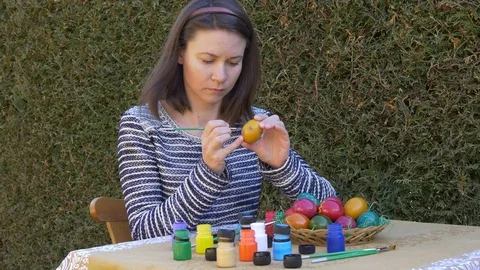 Easter tradition, coloring eggs in bright colors Stock Footage 73457977