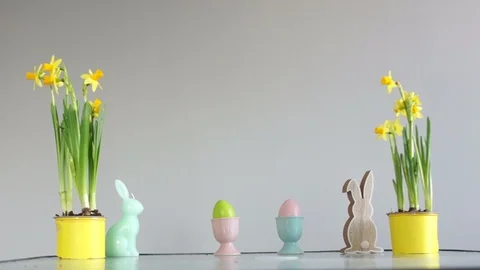 Easter traditions. The boy steals an Easter egg, childish pranks. Curly cute Stock Footage 102550287