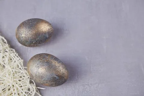 Easter two silver eggs on a gray background Stock Photos