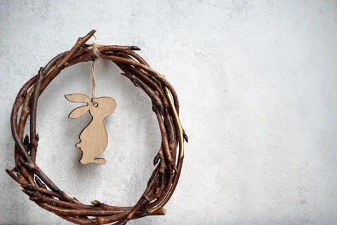 Easter wreath from branches vines with thread on grey background with copyspa Stock Photos