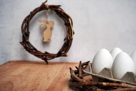 Easter wreath from branches vines with thread on grey background with copyspa Stock Photos
