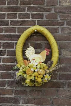 An easter wreath on on old stone wall outdoor Stock Photos