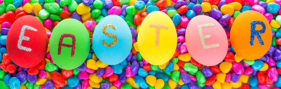 Easter written on eggs Stock Photos