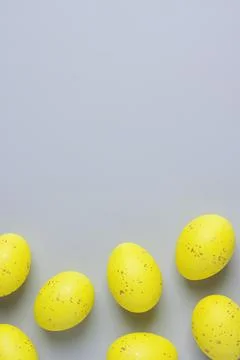 Easter yellow eggs on grey background. Flat lay, copy space. beautiful Stock Photos
