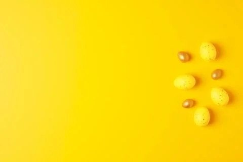 Easter yellow eggs on a yellow background. Flat lay, copy space. beautiful Stock Photos