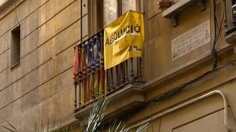 The Eastern Catalan independence flag waves from a balcony, Barcelona, Spain. Stock Footage 127320532