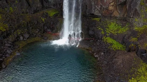 Eastern Icelandic drone shot of waterfall and cinematic landscape Stock Footage 84444461
