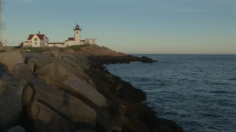 Eastern Point Lighthouse and boulders in Gloucester harbor Massachusetts USA Stock Footage 101927685