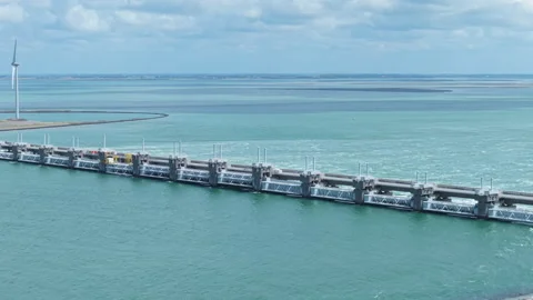Eastern Scheldt barrier and wind turbine generating renewable energy 库存影片 338126255