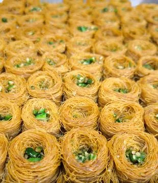 Eastern sweets: crispy kadayif with nuts Stock Photos